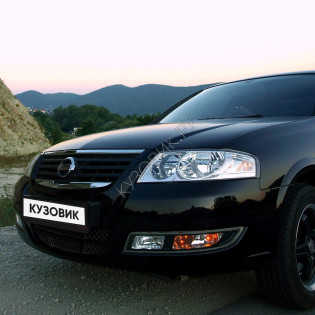 Бампер передний в цвет кузова Nissan Almera Classic (2006-2013)